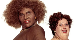 Seriāla "Little Britain" attēls, kas tiek minēts rakstā kā piemērs diskusijai par "blackface" un humora robežām. Seriāla "Little Britain" attēls, kas tiek minēts rakstā kā piemērs diskusijai par "blackface" un humora robežām.